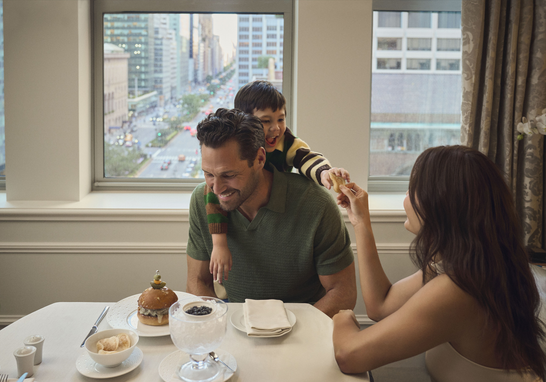 family enjoying Bed and Breakfast at Waldorf Astoria New York